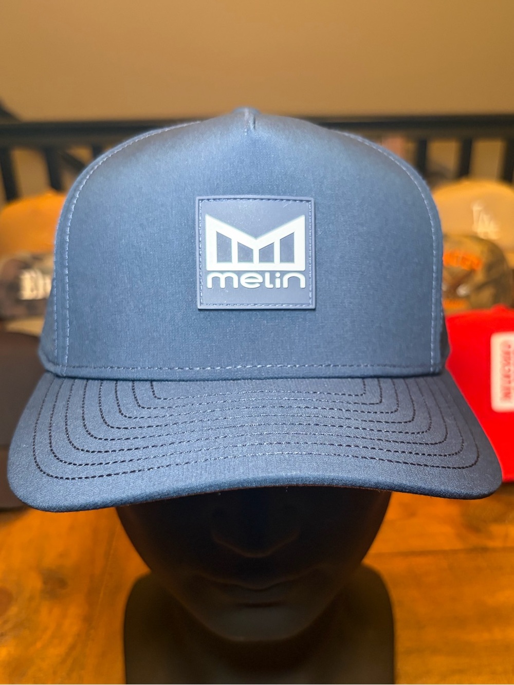 Melin Brand Navy Blue Patch Logo Trucker Hat
